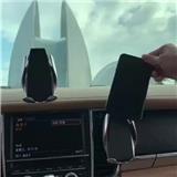 Wireless charger car mount with auto clamping and infrared sensing